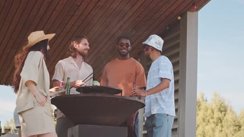 Friends Gather for Backyard Barbecue on Summer Day
