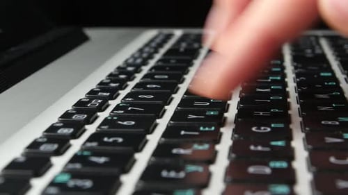 Hands of an Office Worker Typing on Keyboard, Close Up, Cam Moves To the Right, Black