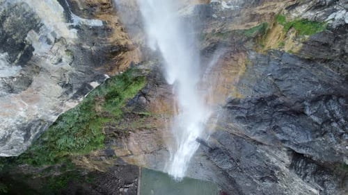 Following the direction of falling water of a waterfall