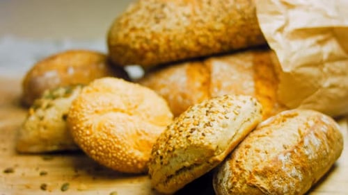 Delicious Assortment of Baked Bread Displayed on Board