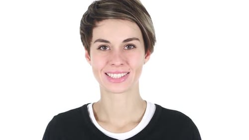 Beautiful Smiling Woman Looking at Camera in Office