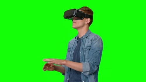 Young Adult Interacting With VR Headset