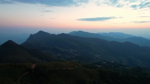 4K Aerial view over the mountains at sunset. Drone Flight Footage
