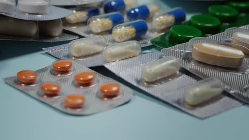Assorted Pills and Capsules in Blister Packs