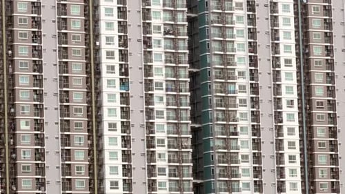 Outside the condominium building, which sees many rooms built in the middle of a large city with the
