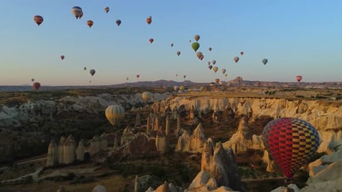 Cappadocia Landscape with Hot Air Balloons at Sunrise