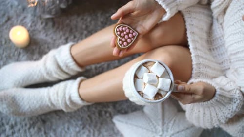 Woman With Hot Chocolate and Heart Cookie