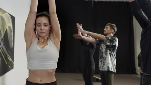 Millennials Practicing Healthy Active Lifestyle in Modern Loft Studio