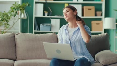 Focused Woman Eeling Tired Stressed of Long Sedentary Lifestyle