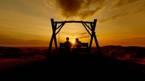 Romantic Couple on Swing Watching Golden Sunset