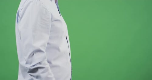 Side view of a man's finger indicating