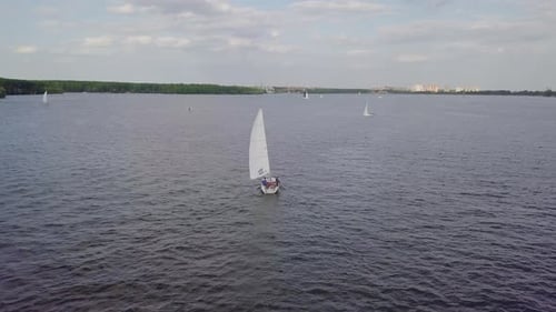Yacht sailing on lake