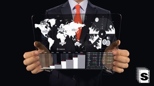 Businessman Holds Transparent Screen Displaying Global Data