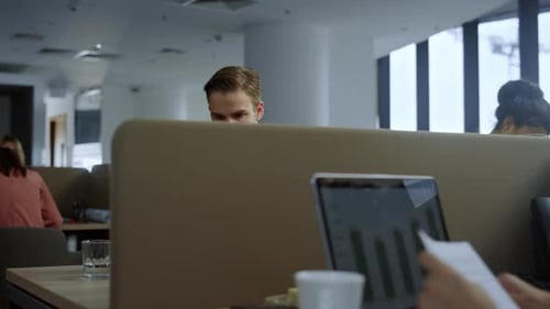 Adults Working in a Modern Office Environment