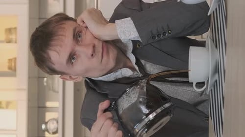 Adult Man Pouring Coffee From Pot Into Cup