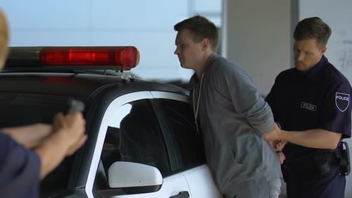 Police Arresting Young Adult Suspect