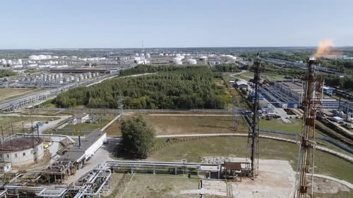 A Tower for Flaring Associated Gas at a Petrochemical Plant. Fiery Torch.