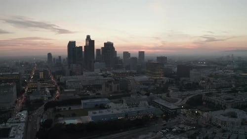 Cinematic View of Busy Downtown Los Angeles Right After Dusk with Skyline City Lights and