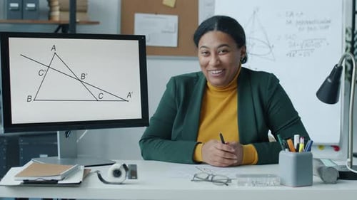 Enthusiastic Woman Teaching Online Geometry Class