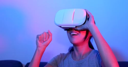 Woman Experiences Virtual Reality with VR Headset