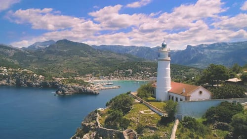 Picturesque mountainous seashore with lighthouse
