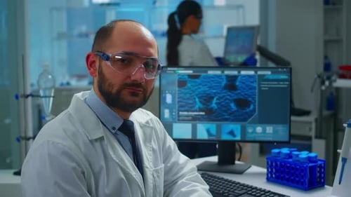 Scientist in Lab Wearing Safety Goggles