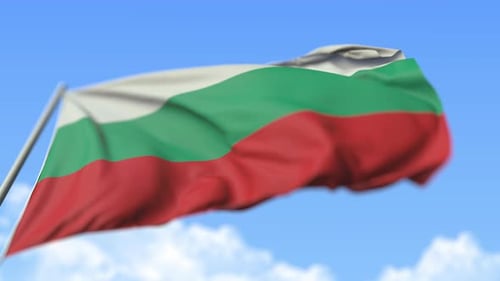 Realistic Bulgarian National Flag Waving Loop Against Blue Sky