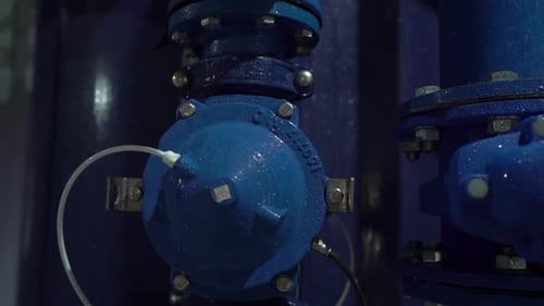 Close Up of Blue Pipes and Industrial Equipment