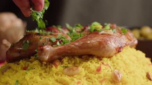 Chicken Legs Garnished with Parsley on Rice