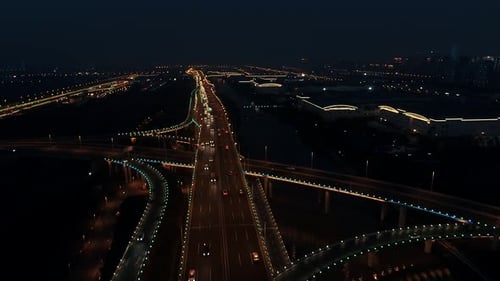 Aerial Top View of Highway Interchange at Night