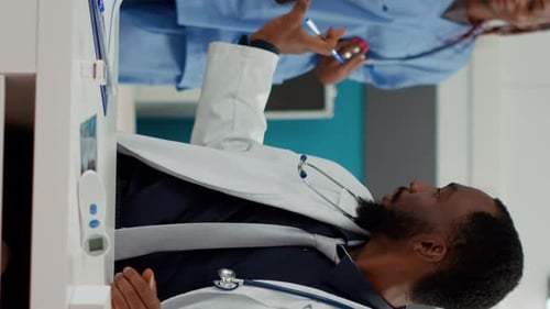 Doctor Preparing Medication in Bright Clinic Setting