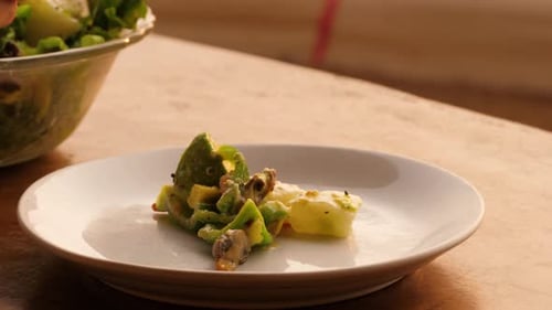 Green Vegan Salad From Green Leaves Mix and Vegetables