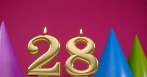 Golden Number 28 Candles and Party Hats