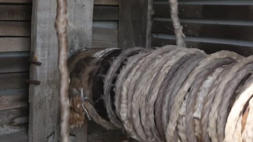 Manual rotation system in water well house slow-mo footage