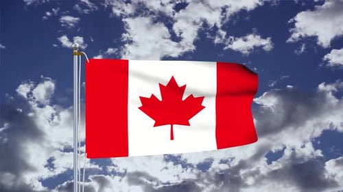 Waving Canadian Flag Against a Blue Sky with Clouds