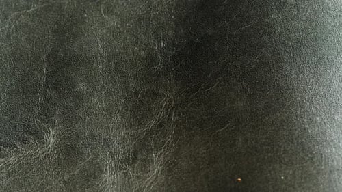 Black Leather Closeup Production of Handmade Accessories Made of Genuine or Artificial Animal Skin