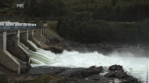 Water Flowing Through Hydroelectric Dam Structure