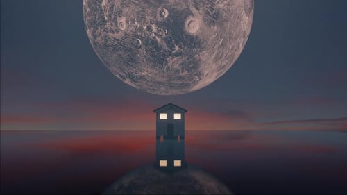 Full moon behind the hill top house, standing in the lake