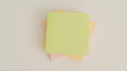Writing Word Plan on Colorful Square Sticky Notes