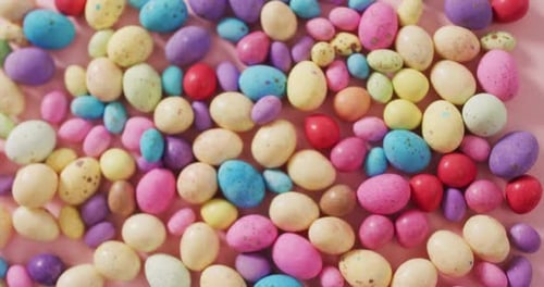 Colorful Easter Eggs Overhead on Pink Background