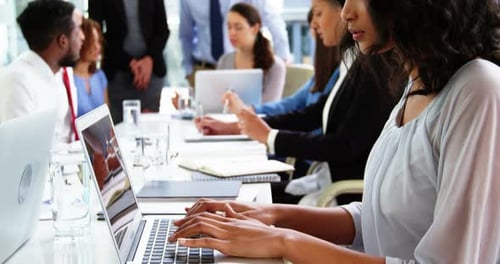 Diverse Business Team Meeting in Modern Office