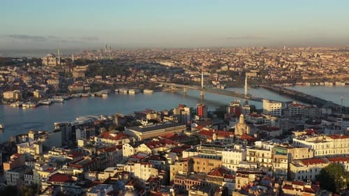 Footage of bosphorus in the sunset having galata tower in the middle