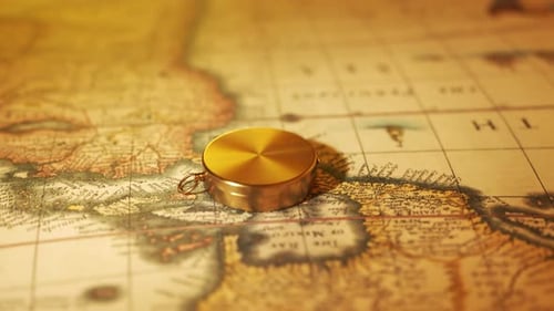 Golden Compass Opening on Vintage World Map