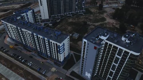 Construction of a modern city block. Multi-storey buildings