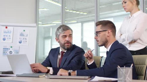 Business Team Collaborates in Modern Office