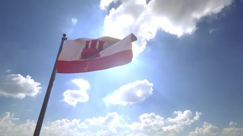 Gibraltar Flag Waving on Sunny Sky with Clouds