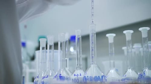 Laboratory Beakers and Chemistry Experiment Close Up