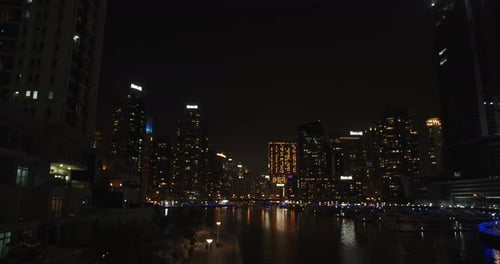 Dubai Creek with Massive Skyscrapers Gorgeous View at Night Reflections