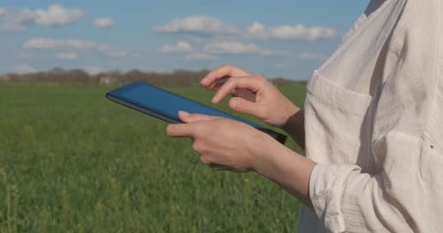 Farmer with Tablet in the Field