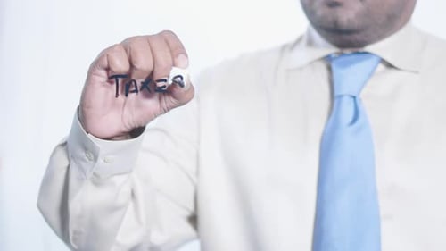 Asian Businessman Writes Taxes